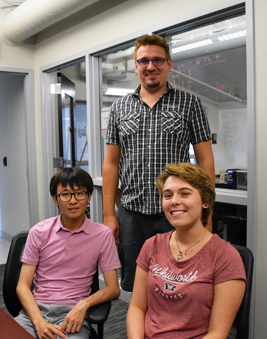 REU Alyssa LaFleur (lower right) works in the lab of Dr. Tomas Helikar (top) with postdoc Kenneth Wertheim at University of Nebraska-Lincoln.