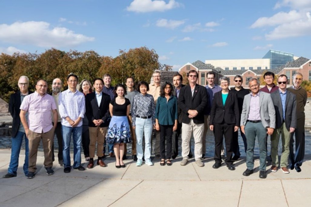 Christian Binek, Charles Bessey Professor of physics and director of the Nebraska Center for Materials and Nanoscience, and Susan Hermiller, Willa Cather Professor of mathematics, stand with members of the Quantum Science and Engineering team selected for research funding via UNL’s Grand Challenges Initiative.